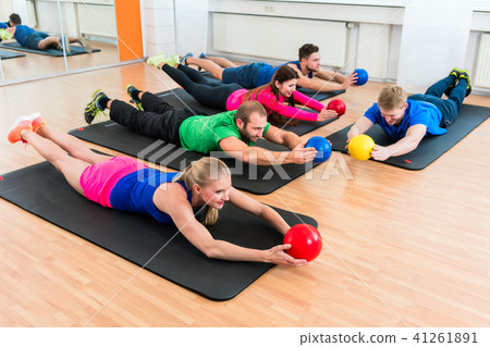 Workout group in gymnasium during physiotherapy  41261891
