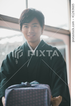 present, hakama with family crest, person 41263685