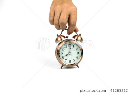 hands holding Vintage alarm clock on white hands holding Vintage alarm clock on white 41265212