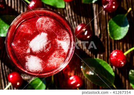 Top view cherries and cherry fruit drink on wood 41267354