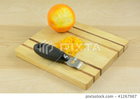 Orange, orange zest and zester 41267987