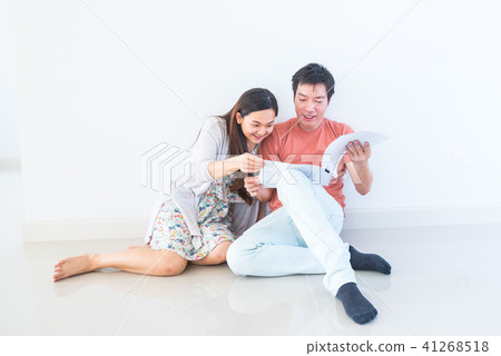 Couple buy a new house. Planing to decorate home 41268518