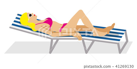 A woman lying on a deck chair - side 41269130