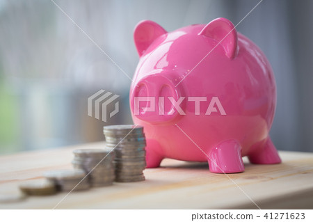 Dirty and Old Coin stacks up into the piggy bank. Dirty and Old Coin stacks up into the piggy bank. 41271623