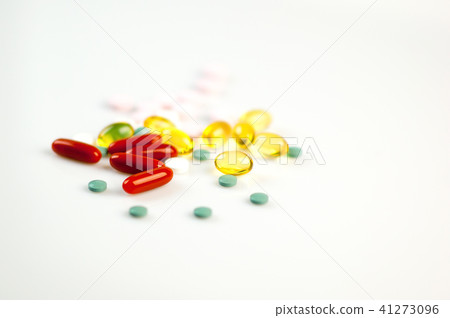 Many Colorful Pills Lying on White Background, Isolated. Medicine Concept. Many Colorful Pills Lying on White Background, Isolated. Medicine Concept. 41273096