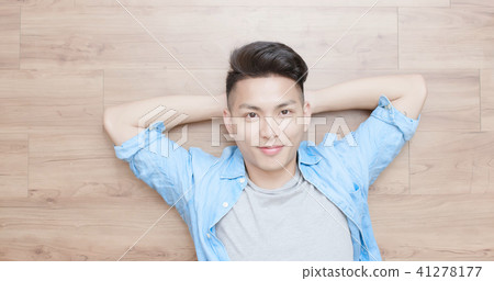 man lying on the floor 41278177