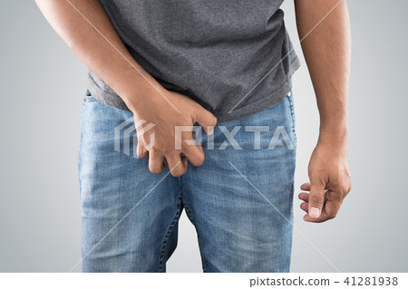 Asian men grab or cover his crotch. Asian men grab or cover his crotch. 41281938