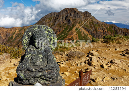 Stone Buddha and Akadake of Yatsugatake mountain peak · Amidadake summit 41283294