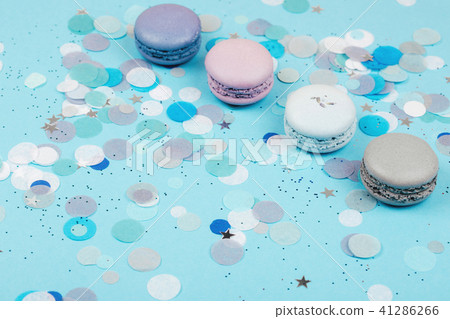 Group of pastel colorful macarons on trendy background 41286266