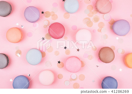 Group of pastel colorful macarons on trendy background 41286269
