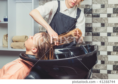 Hair wash procedure in a beauty salon 41288744