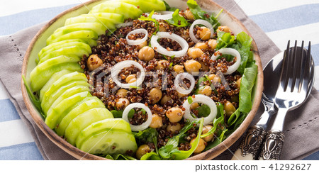 Quinoa salad bowl with cucumbers, chickpeas 41292627