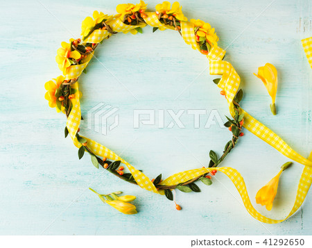 Yellow flower wreath girl head band on pastel Yellow flower wreath girl head band on pastel 41292650
