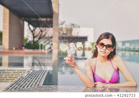 Swimsuit Concept. Beautiful girl wearing pink swimsuit. Beautifu 41292715