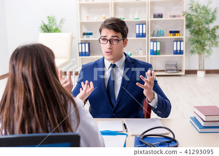 Businessman discussing health issues with doctor 41293095