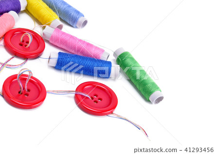 Sewing thread and buttons isolated on white Sewing thread and buttons isolated on white 41293456