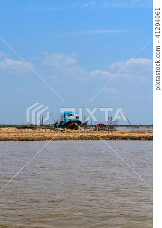 Wooden boat on land Tonle Sap lake in Cambodia Wooden boat on land Tonle Sap lake in Cambodia 41294961