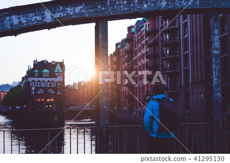 Photograph capture sunset on massive steel construction of Poggenmoehlenbruecke bridge near the 41295130