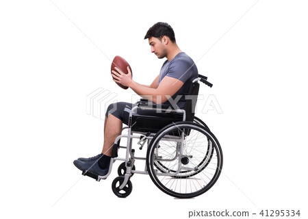 Football player recovering from injury on wheelchair 41295334
