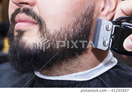 Beard styling and cut. Beard styling and cut. 41295897