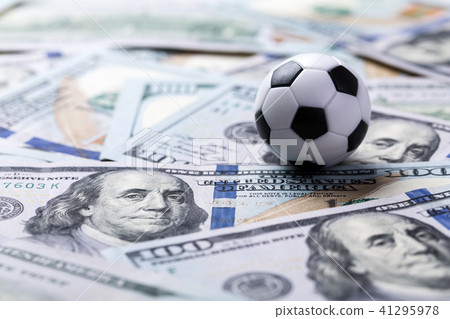 Soccer ball on dollar banknotes Soccer ball on dollar banknotes 41295978
