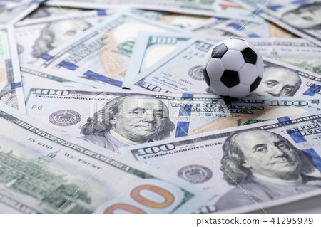 Soccer ball on dollar banknotes Soccer ball on dollar banknotes 41295979