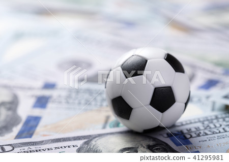 Soccer ball on dollar banknotes Soccer ball on dollar banknotes 41295981