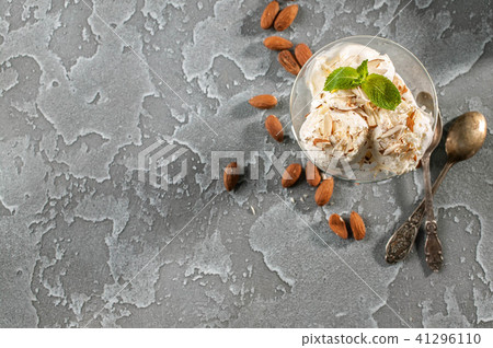 Vanilla ice cream with almonds. Top view Vanilla ice cream with almonds. Top view 41296110