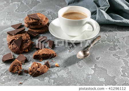 Chocolate biscuits and a cup of coffee Chocolate biscuits and a cup of coffee 41296112