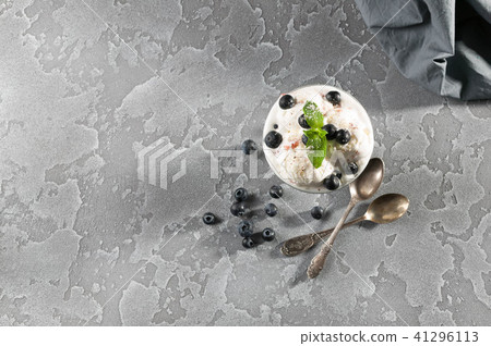Vanilla ice cream with blueberries. Top view Vanilla ice cream with blueberries. Top view 41296113