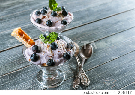 Curd dessert with blueberries and slices Curd dessert with blueberries and slices 41296117