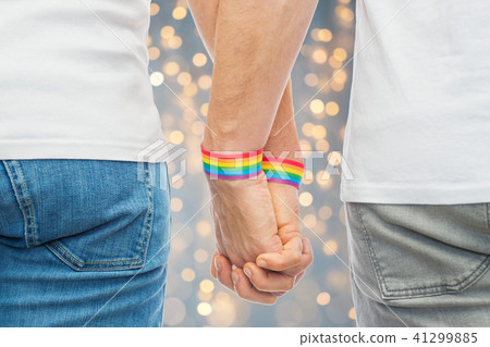 male couple with gay pride rainbow wristbands male couple with gay pride rainbow wristbands 41299885