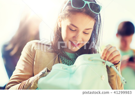 high school student girl with backpack outdoors high school student girl with backpack outdoors 41299983
