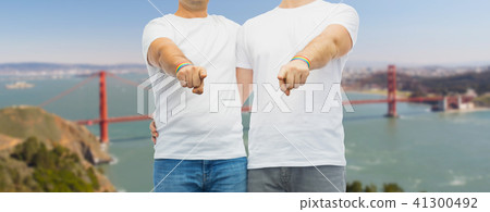 couple with gay pride rainbow wristbands couple with gay pride rainbow wristbands 41300492