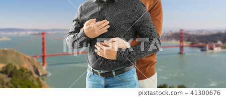 close up of hugging gay couple in san francisco close up of hugging gay couple in san francisco 41300676