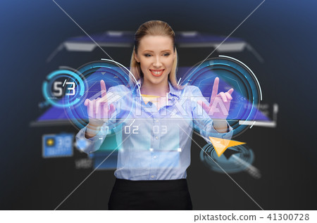 businesswoman with navigator on virtual screen businesswoman with navigator on virtual screen 41300728