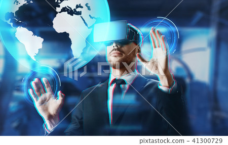 businessman in virtual reality headset with earth 41300729