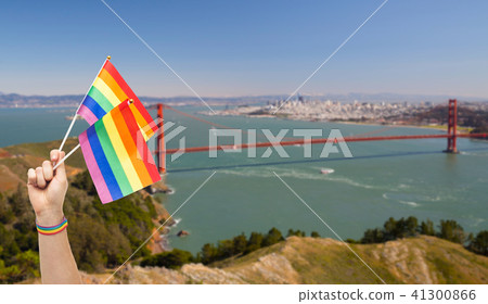 hand with gay pride rainbow flags and wristband 41300866