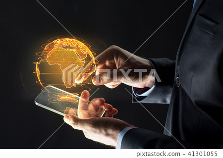 hands with smartphone and earth hologram hands with smartphone and earth hologram 41301055
