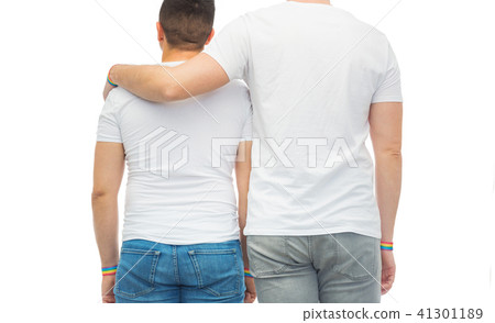 male couple with gay pride rainbow wristbands 41301189