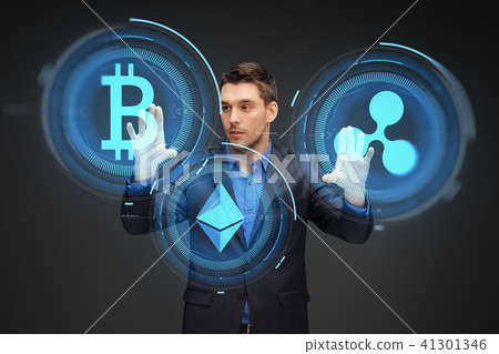 businessman with cryptocurrency holograms businessman with cryptocurrency holograms 41301346