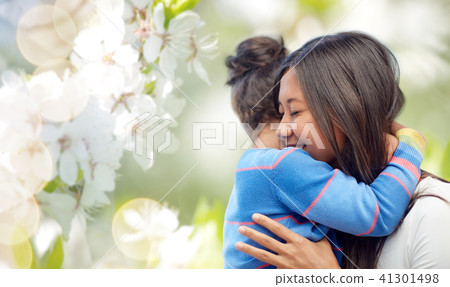 happy mother and daughter hugging happy mother and daughter hugging 41301498