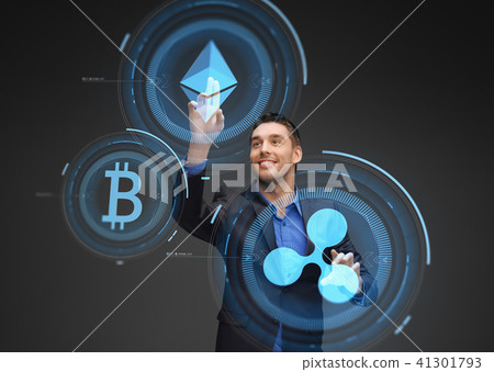 businessman with cryptocurrency holograms 41301793