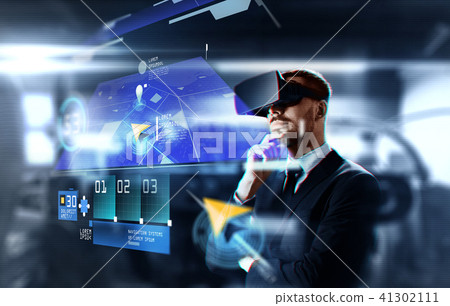 businessman in virtual reality headset with gps 41302111