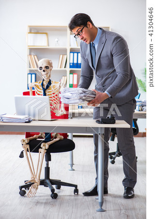 Angry boss yelling at his skeleton employee 41304646