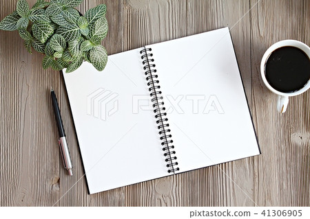 Notebook and coffee on office desk table Notebook and coffee on office desk table 41306905
