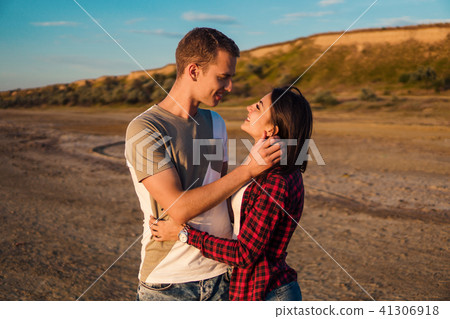 lovestory of couple on the beach On the Sunset 41306918