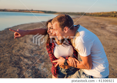 lovestory of couple on the beach On the Sunset lovestory of couple on the beach On the Sunset 41306921