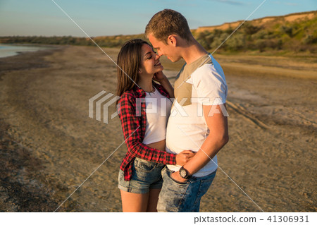 lovestory of couple on the beach On the Sunset lovestory of couple on the beach On the Sunset 41306931