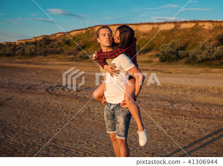 lovestory of couple on the beach On the Sunset lovestory of couple on the beach On the Sunset 41306944